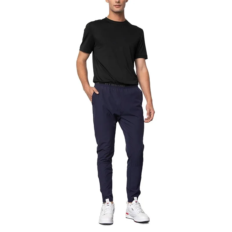 Pantalón slim zip fila